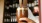 close-up of a bartender pouring a drink from draft