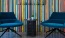 a colorful wall in the lobby area