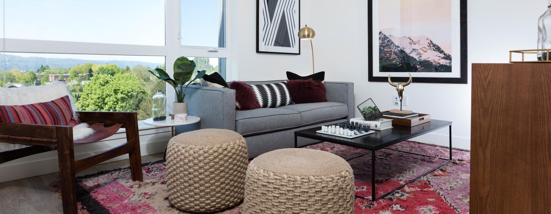 a living room with a couch and chairs