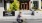 a person riding a bicycle outside of property