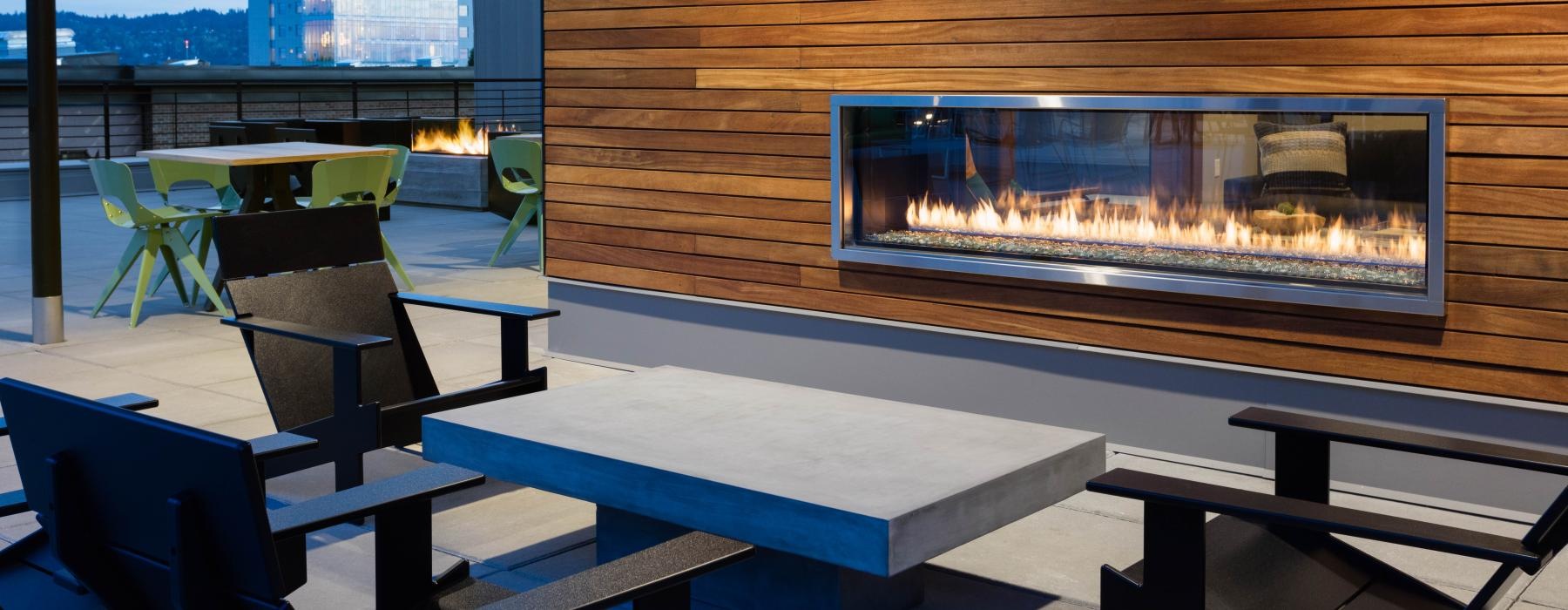 spacious seating near an electric fireplace