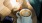 overhead view of a coffee and a cold drink on a wooden table