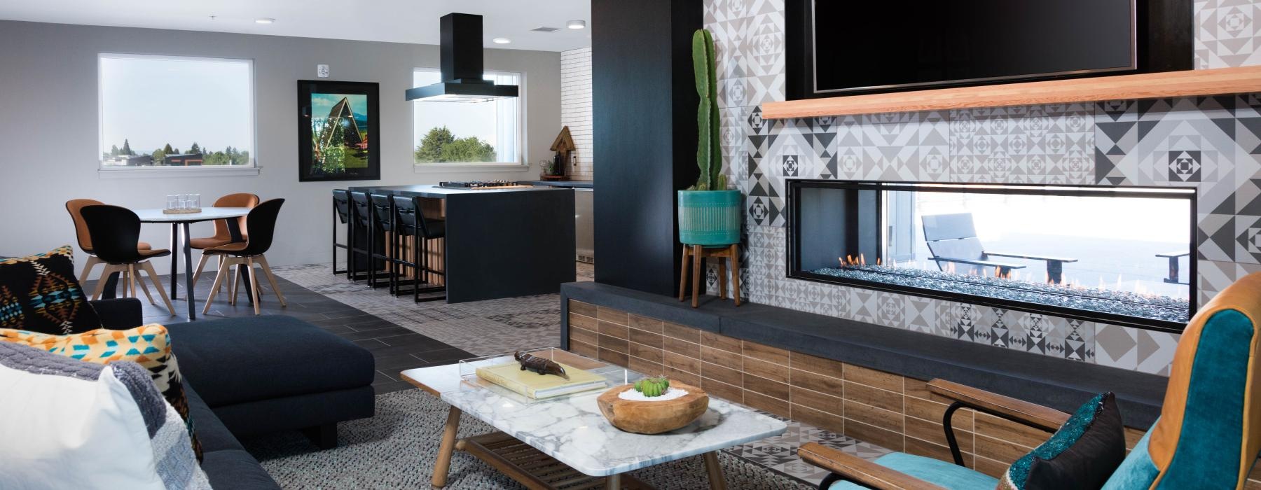 area of lounge where seating faces a large TV