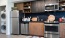 a kitchen with stainless steel appliances